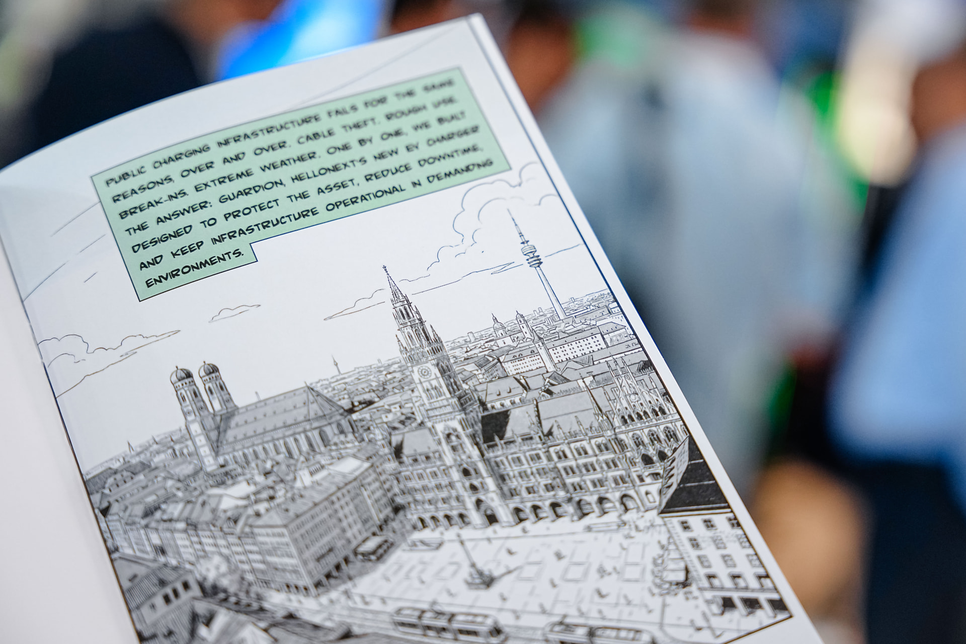 GUARDiON comic book interior: Munich skyline and the threats to public charging