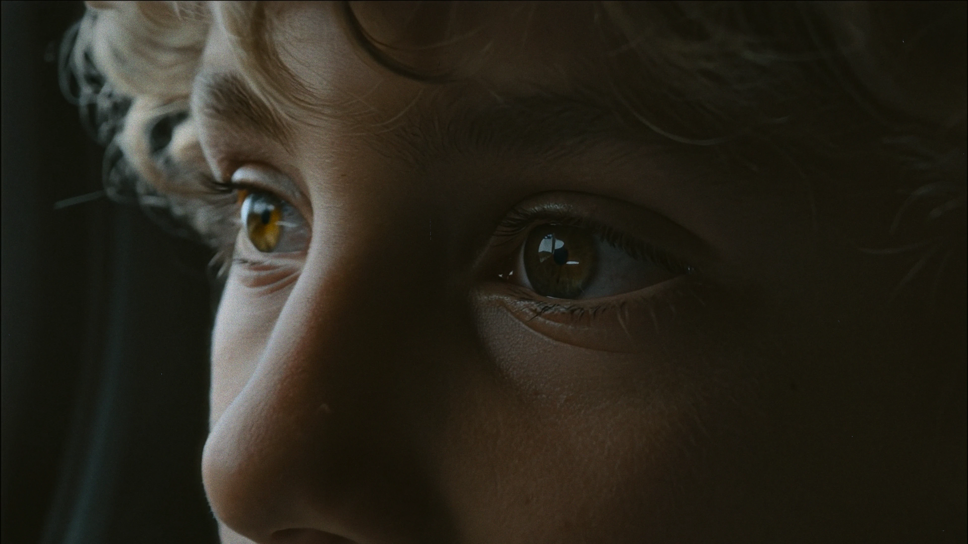 Extreme close-up of child's eyes, cinematic film still