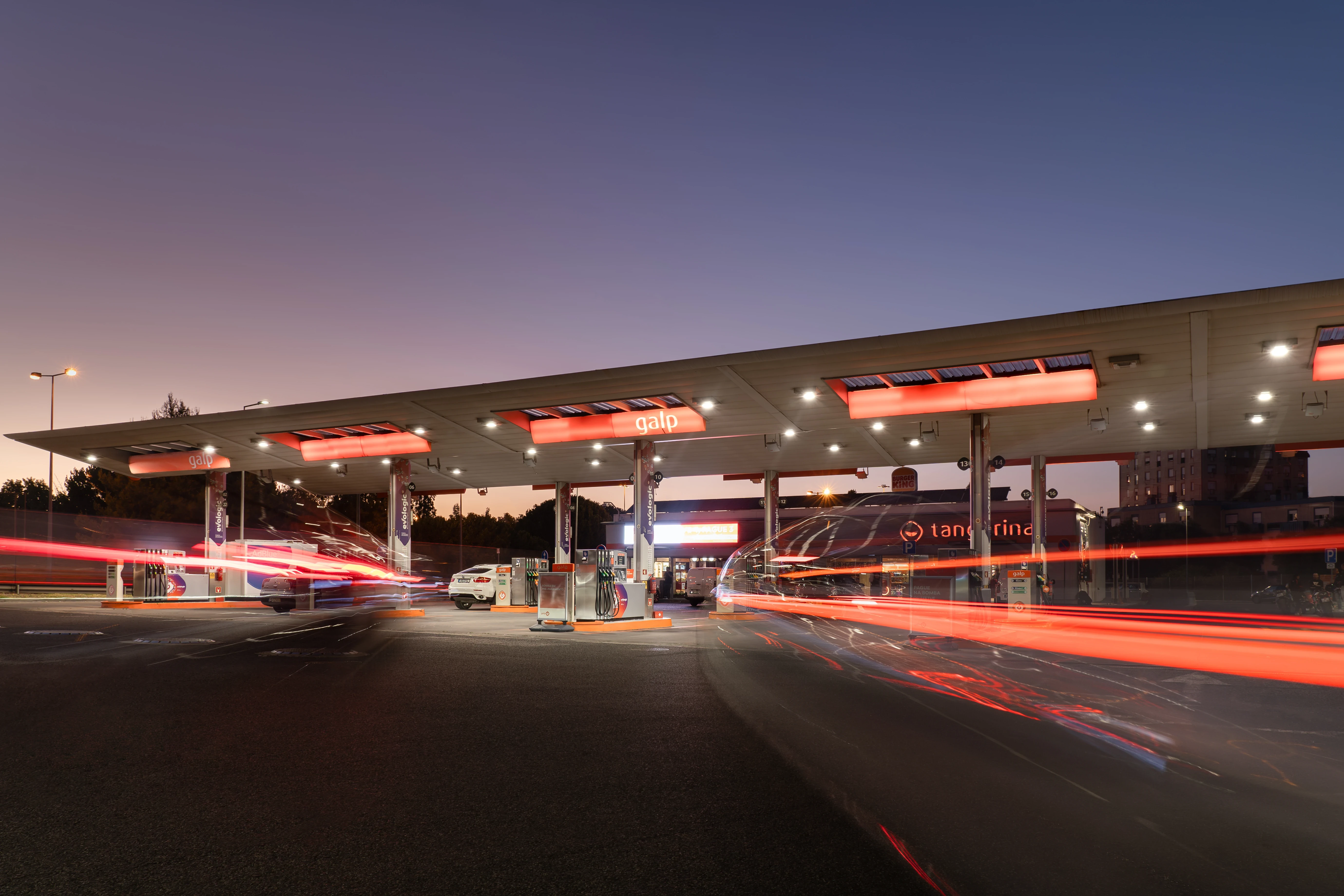 GALP station long exposure: red and white light trails at dusk